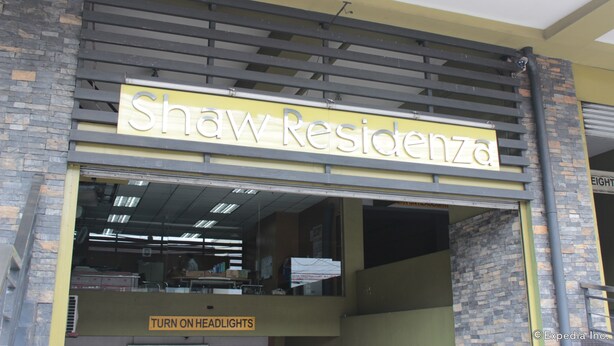 A hotel entrance with a sign reading "Shaw Residencia." - Shaw Residenza Suites (Mandaluyong)