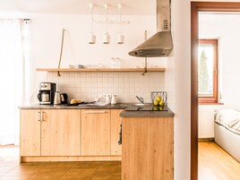 Apartment, 1 Bedroom (Oskar) | Private kitchenette | Fridge, microwave, stovetop, coffee/tea maker