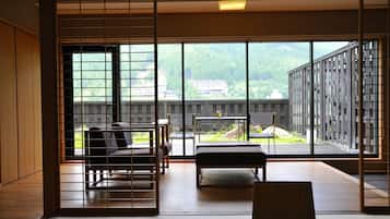 Japanese Western-Style Suite with Semi-Outdoor Bath (Half Board) | In-room safe, blackout drapes, bed sheets