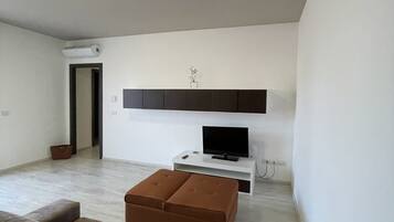 Appartement Deluxe, 2 chambres | Coin séjour