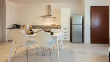 Apartment, 1 Bedroom | Living room | Flat-screen TV