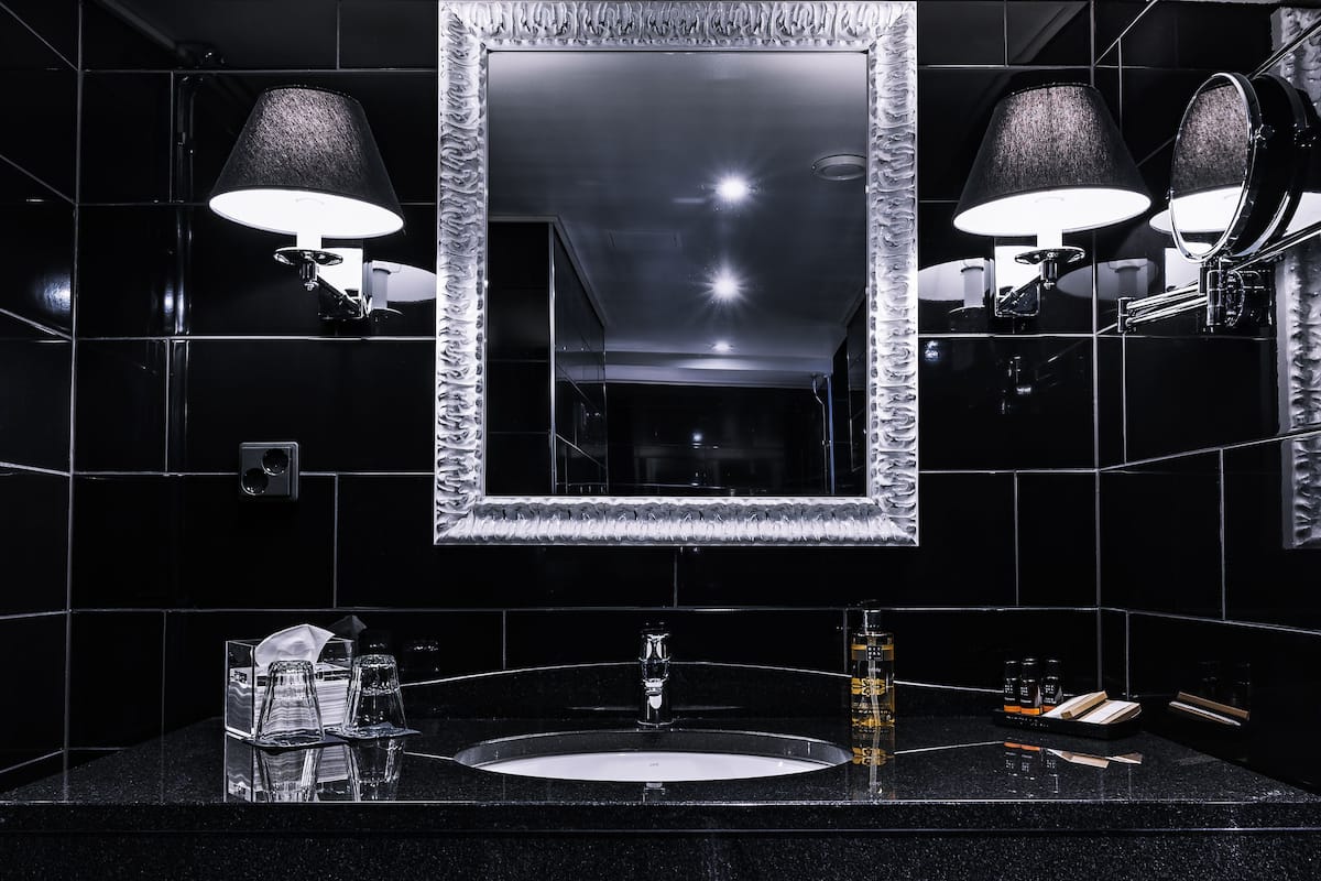 designer toiletries, hair dryer, bathrobes, slippers