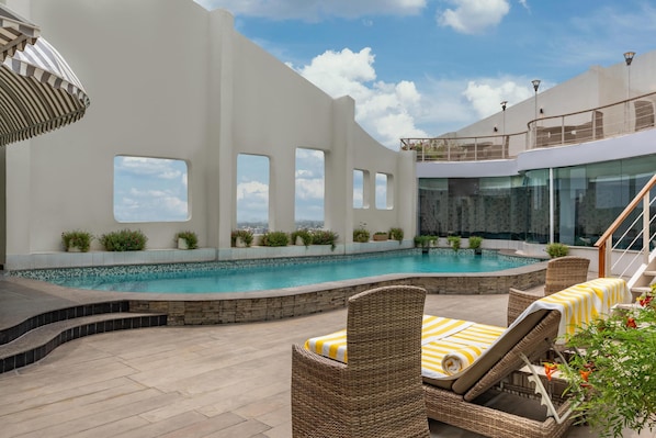 Outdoor pool, pool loungers