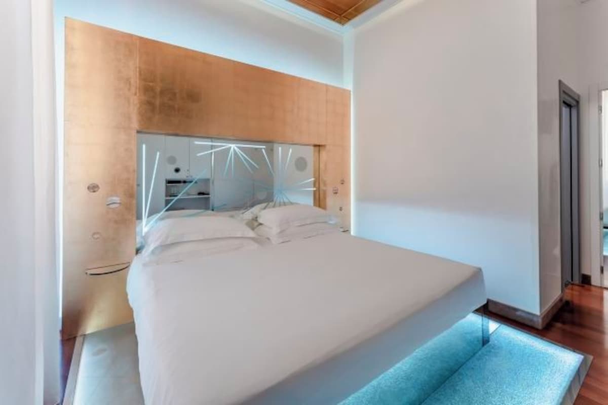 Draps italiens de Frette, literie de qualité, minibar