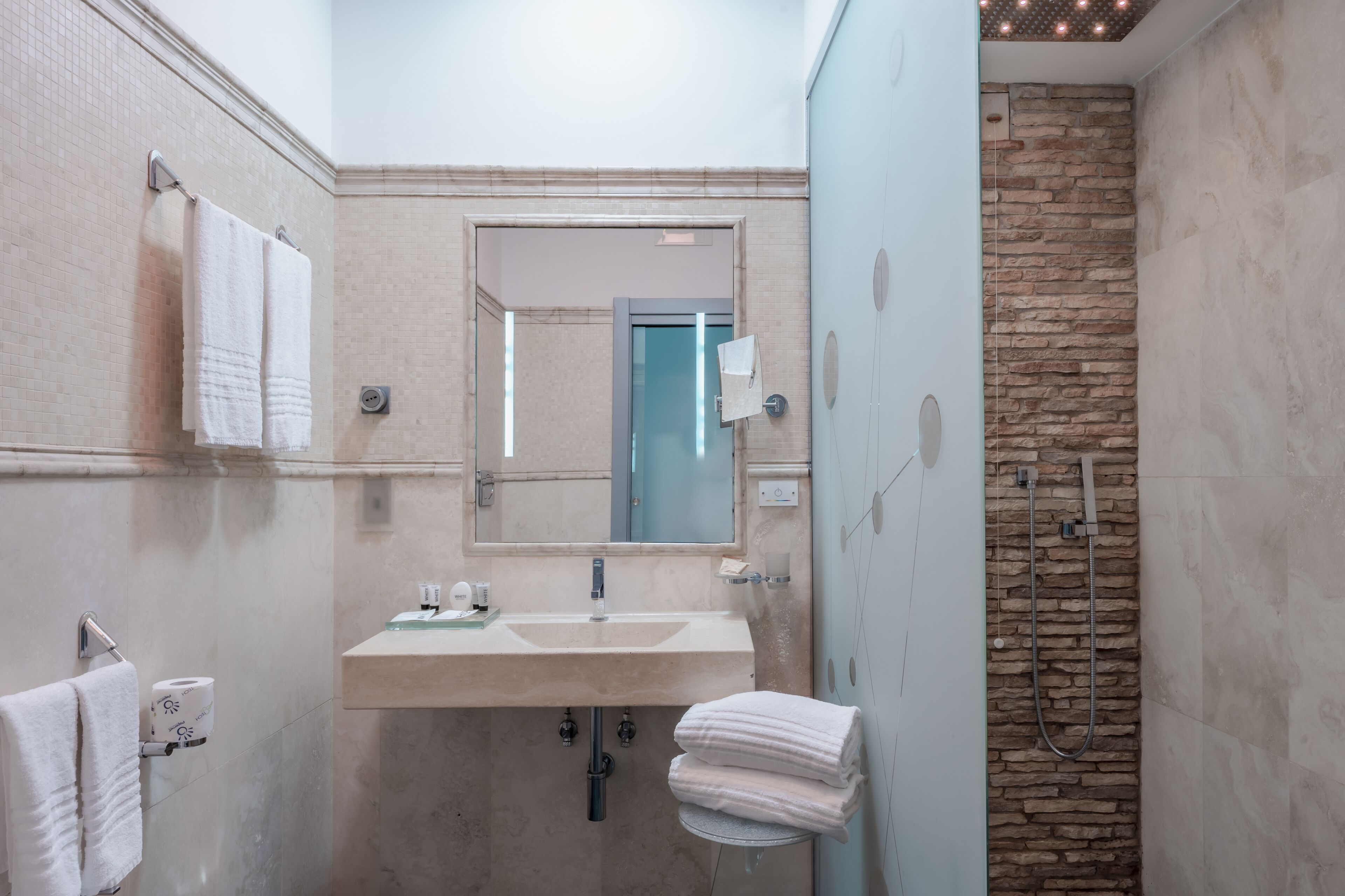 superior double room | bathroom | eco-friendly toiletries, hair dryer, bidet, towels