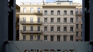 A multi-story building with balconies and windows. - Hotel Trecento (Rome)