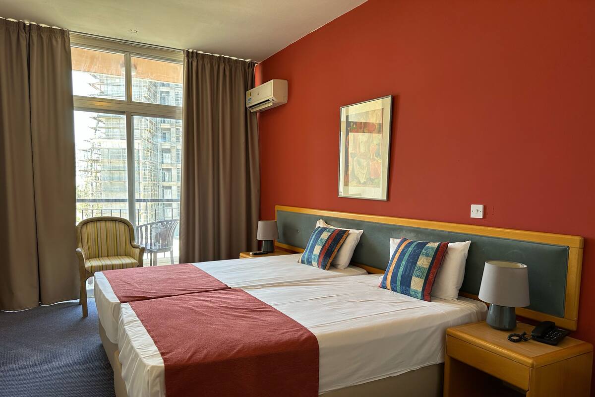 Standard Twin Room, 1 Bedroom, Non Smoking, Partial Sea View | Soundproofing, WiFi (free), bed sheets