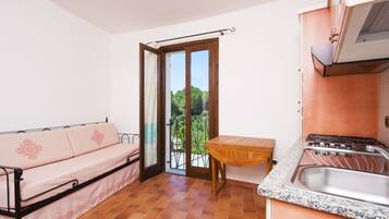 Apartment, 1 Bedroom, Kitchenette (4 people) | Living area | 22-inch TV with digital channels