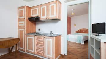 Departamento, 1 cama matrimonial | 2 habitaciones, caja de seguridad en la habitación y cunas