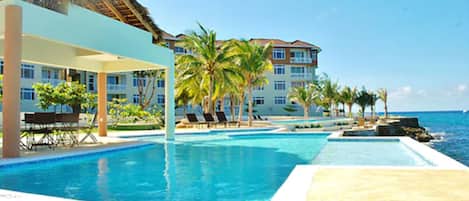 2 outdoor pools, free cabanas, sun loungers