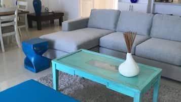 Design Quadruple Room, 2 Bedrooms, Accessible, Ocean View | Living area | Flat-screen TV