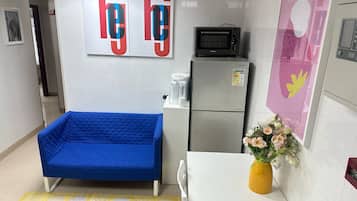 Private Apartment for 16 people (5 bedroom, 1 living room) | Living area | TV