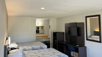 Tabla de planchar con plancha, wifi gratis y ropa de cama