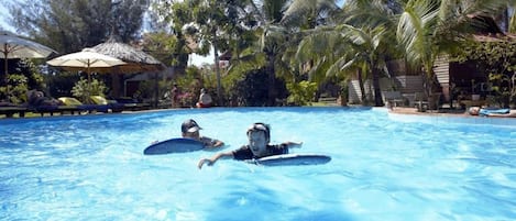 Outdoor pool, pool umbrellas, sun loungers