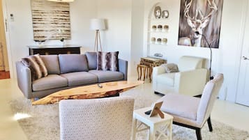 Panoramic Suite, 1 Bedroom (Penthouse Suite) | Living room | LCD TV, pay movies