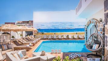 Outdoor pool, pool umbrellas, pool loungers