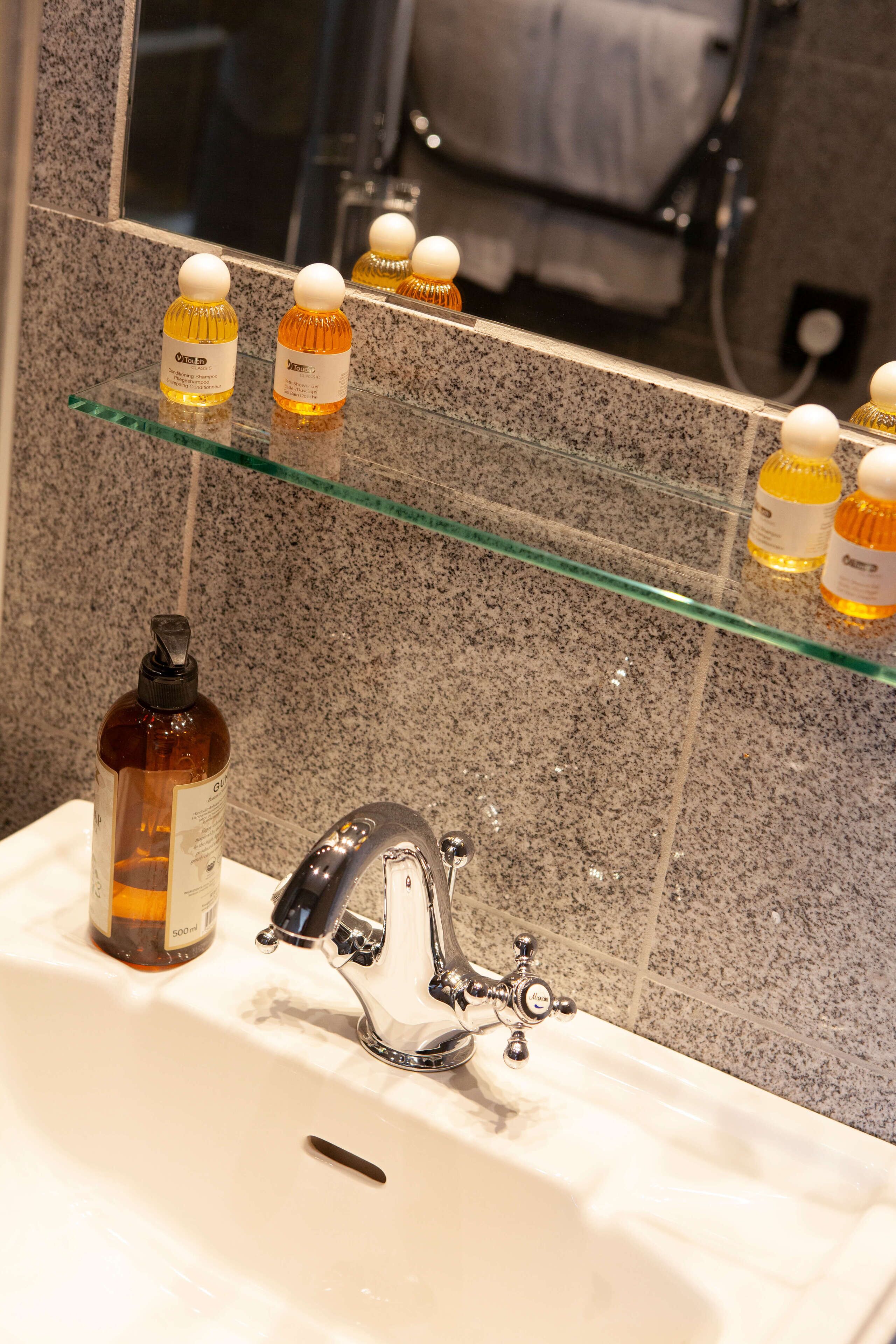 shower, free toiletries, hair dryer, towels