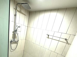 Hydromassage showerhead, designer toiletries, hair dryer, bathrobes