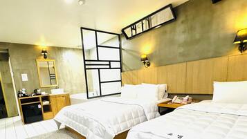 Premium bedding, pillow-top beds, individually decorated, desk