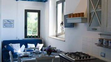 Apartment, 1 Schlafzimmer | Essbereich im Zimmer