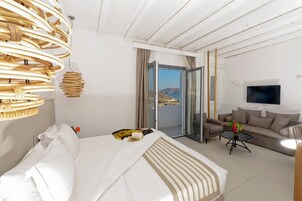 Junior Suite, Sea View | Minibar, in-room safe, desk, laptop workspace