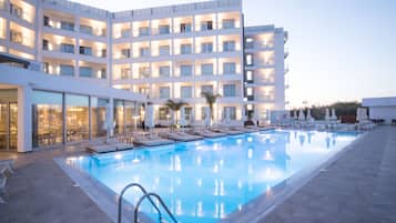 Seasonal outdoor pool, pool umbrellas, pool loungers