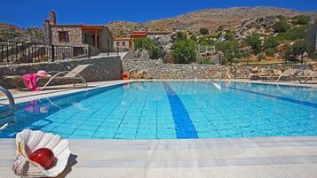 Outdoor pool, pool umbrellas, pool loungers