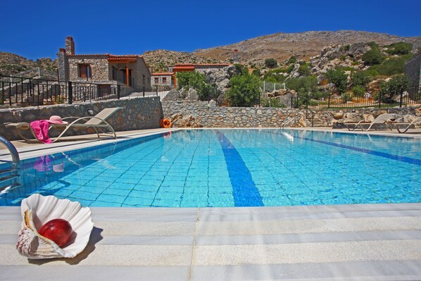 Outdoor pool, pool umbrellas, pool loungers