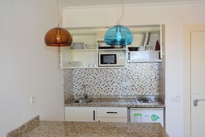 Fridge, stovetop, cookware/dishes/utensils