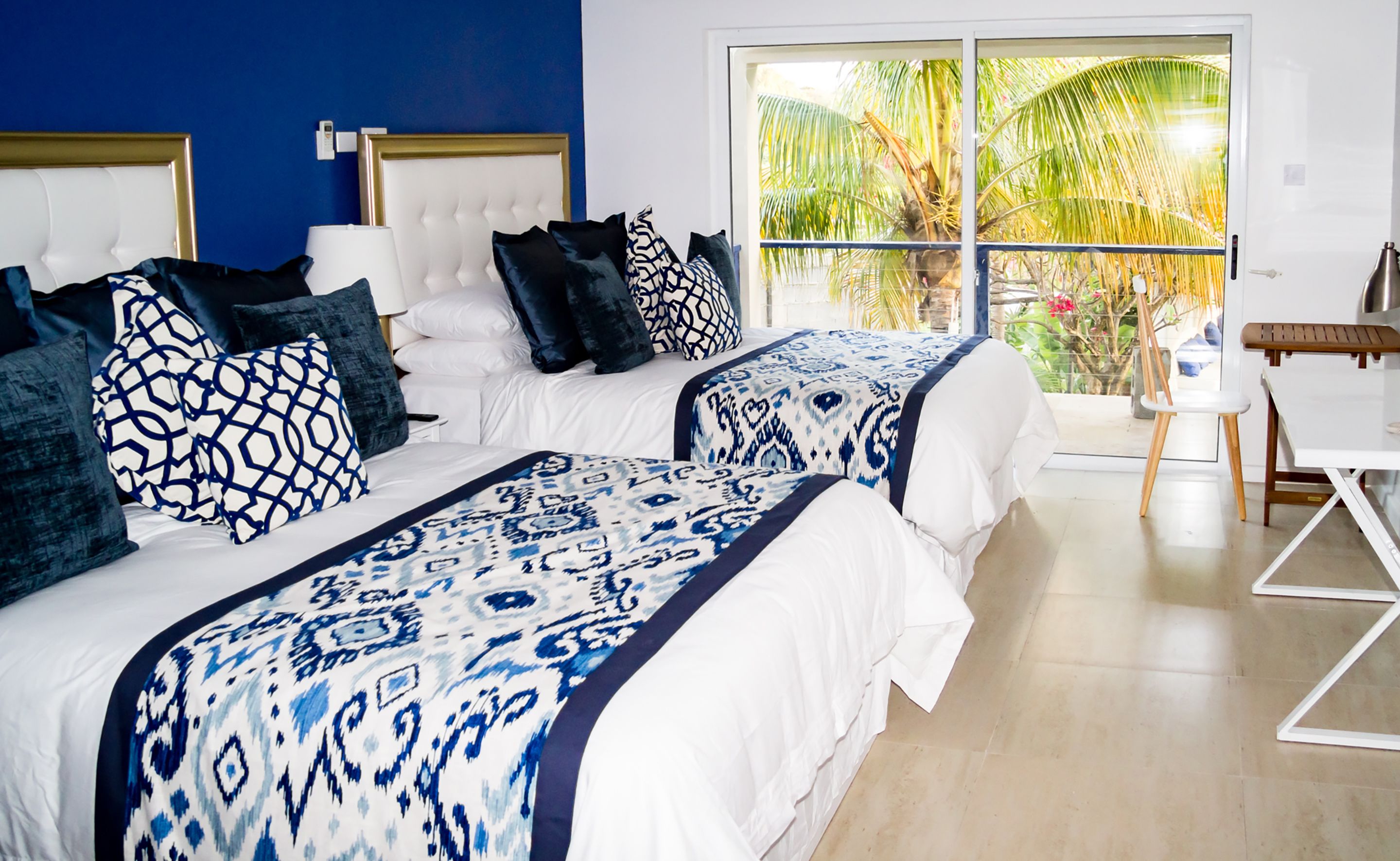 room, 2 queen beds, pool view | pillow-top beds, in-room safe, individually decorated