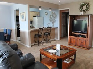 Condo, 2 Bedrooms (2 Queen, 1 Sofa Bed, Private Deck) | Living area | Flat-screen TV - Treehouse Condominiums (Branson)