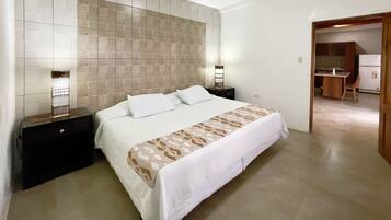 Suite, 1 King Bed | Down comforters, pillowtop beds, desk, individually decorated