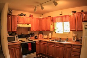 House, 2 Bedrooms | Private kitchen | Fridge, microwave, coffee/tea maker, cookware/dishes/utensils - Cymbidium Cottage (Volcano)
