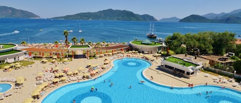 Indoor pool, outdoor pool, pool umbrellas, sun loungers