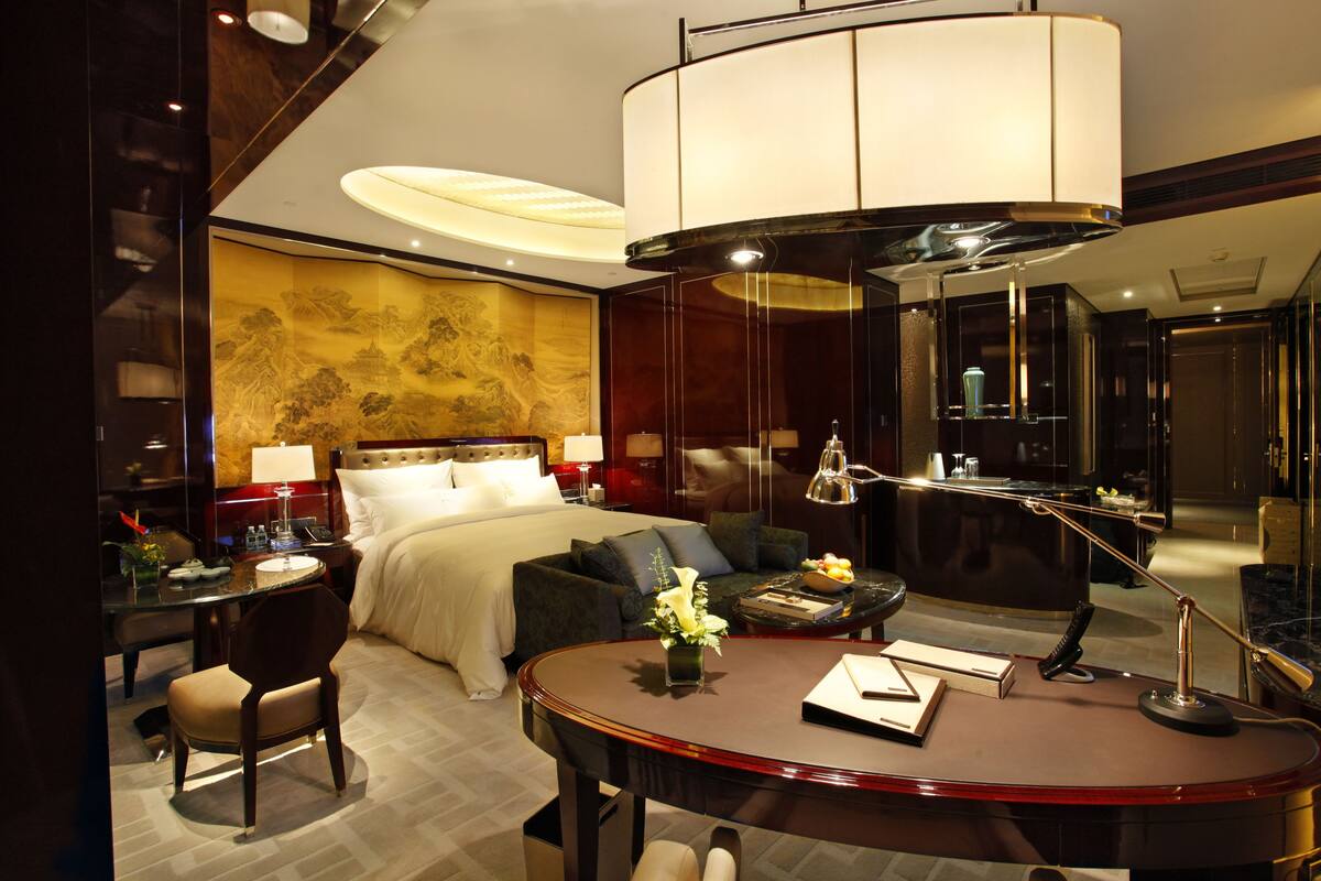 Premium bedding, down comforters, minibar, in-room safe