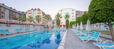 Outdoor pool, pool umbrellas, pool loungers