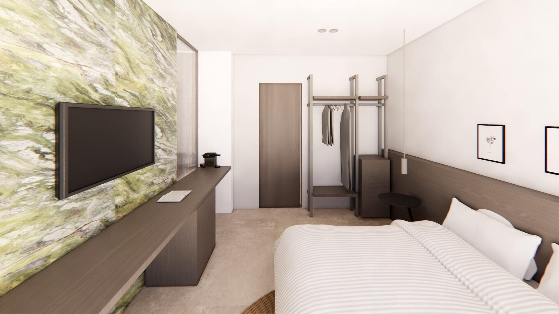 Une chambre d’hôtel moderne équipée d’un grand lit, d’une télévision, d’un bureau et d’une armoire.