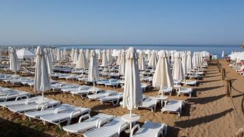 Strandtücher, Strandbar, Motorbootfahrt