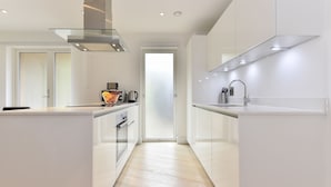 Apartment, 2 Bedrooms | Private kitchen | Coffee/tea maker, full-size fridge, microwave, stovetop - Andrew Superior Apartments (London)
