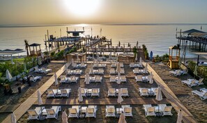 Private beach, free beach shuttle, free beach cabanas, sun-loungers