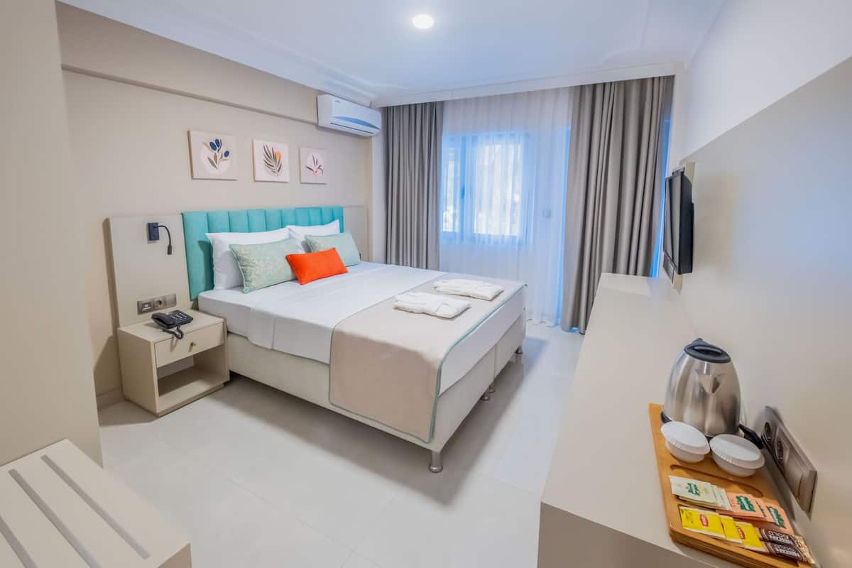 Egyptian cotton sheets, premium bedding, memory foam beds, free minibar