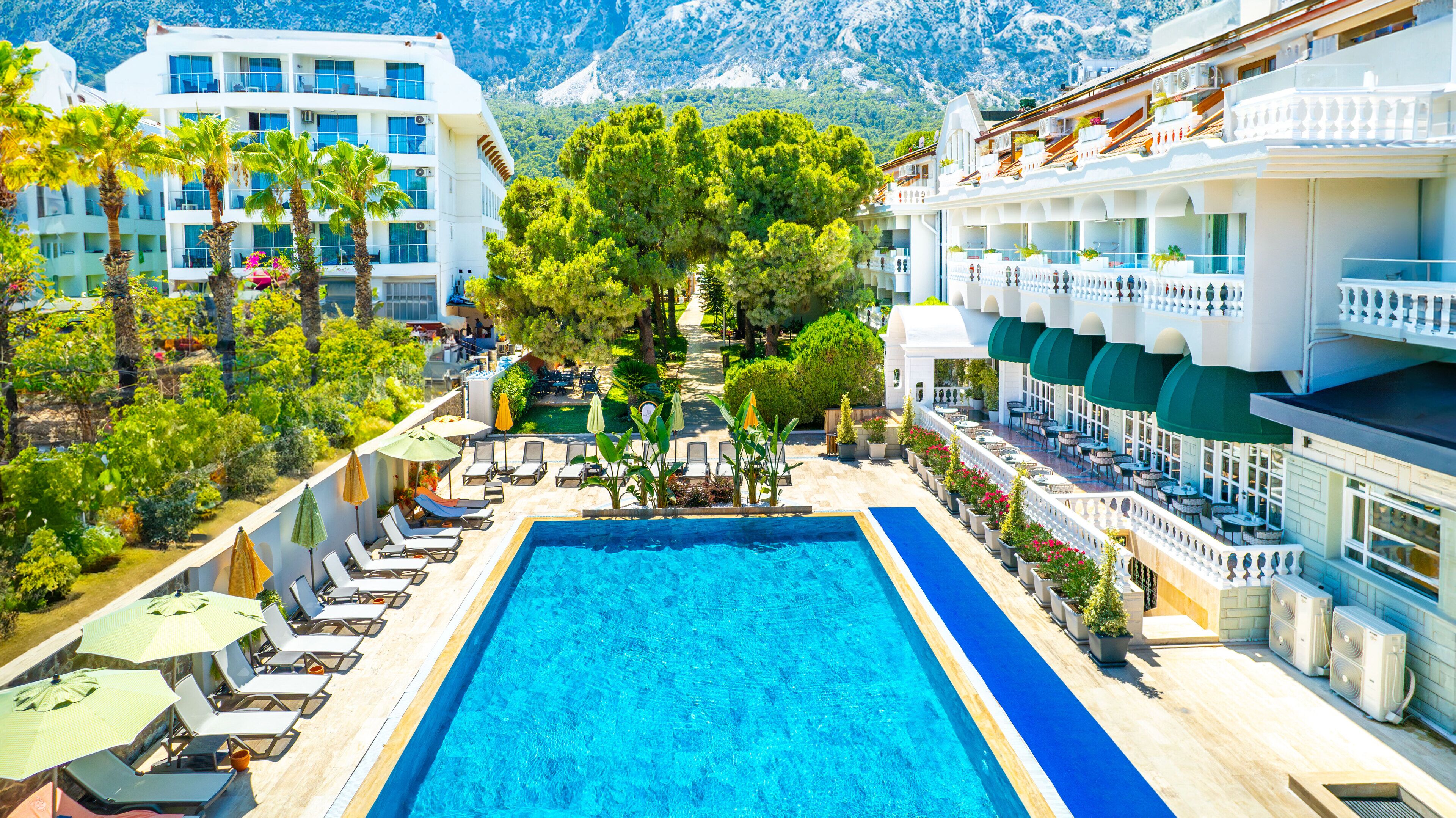 Outdoor pool, pool umbrellas, sun loungers