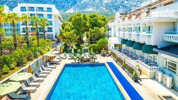 Outdoor pool, pool umbrellas, sun loungers