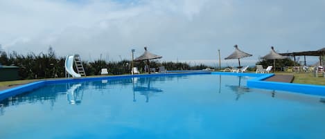 Seasonal outdoor pool, free pool cabanas, pool umbrellas