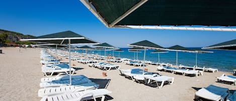 Private beach nearby, sun loungers, beach umbrellas, beach volleyball