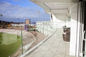 Enjoy unobstructed views of the surrounding area from the spacious balcony.