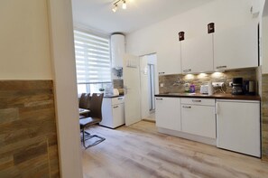 Apartment (Braunhubergasse 25 – 29 - 1110 Vienna) | Dapur peribadi | Peti sejuk, ketuhar gelombang mikro, dapur, mesin basuh pinggan mangkuk