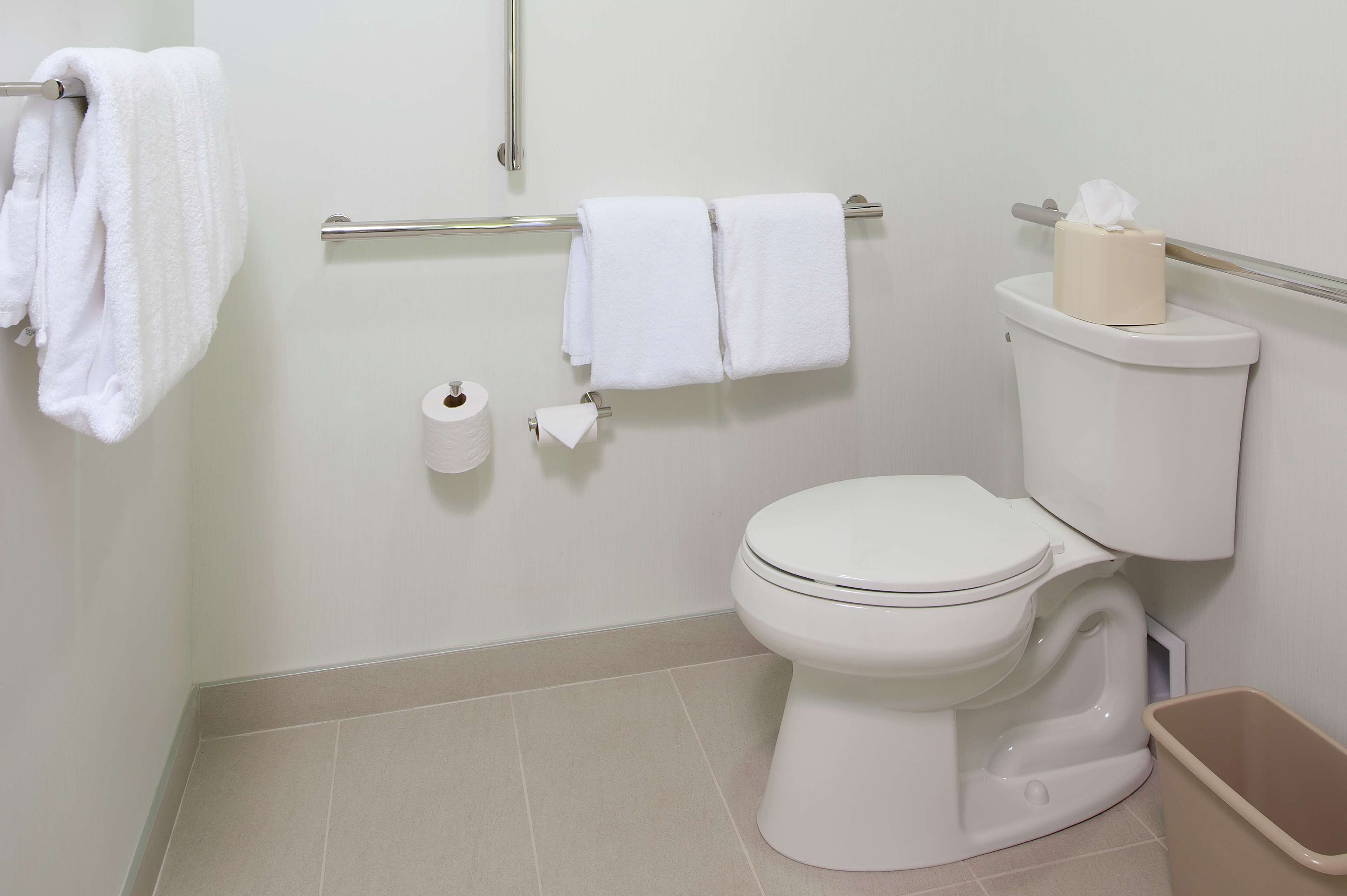 combined shower/bathtub, designer toiletries, hair dryer, towels