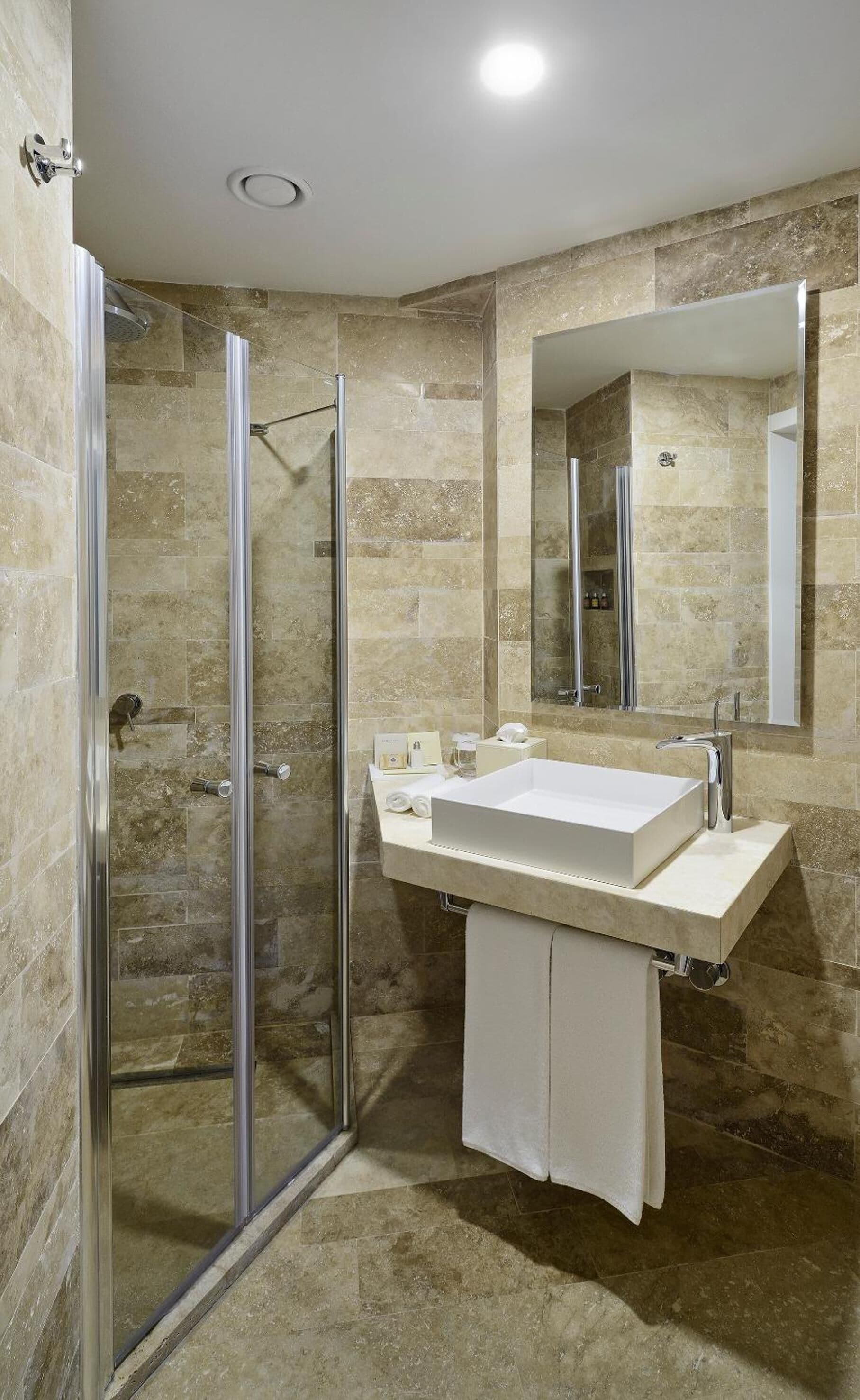 shower, rainfall showerhead, designer toiletries, hair dryer