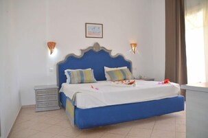 Suite | Caja fuerte, cunas gratuitas, wifi gratis y ropa de cama
